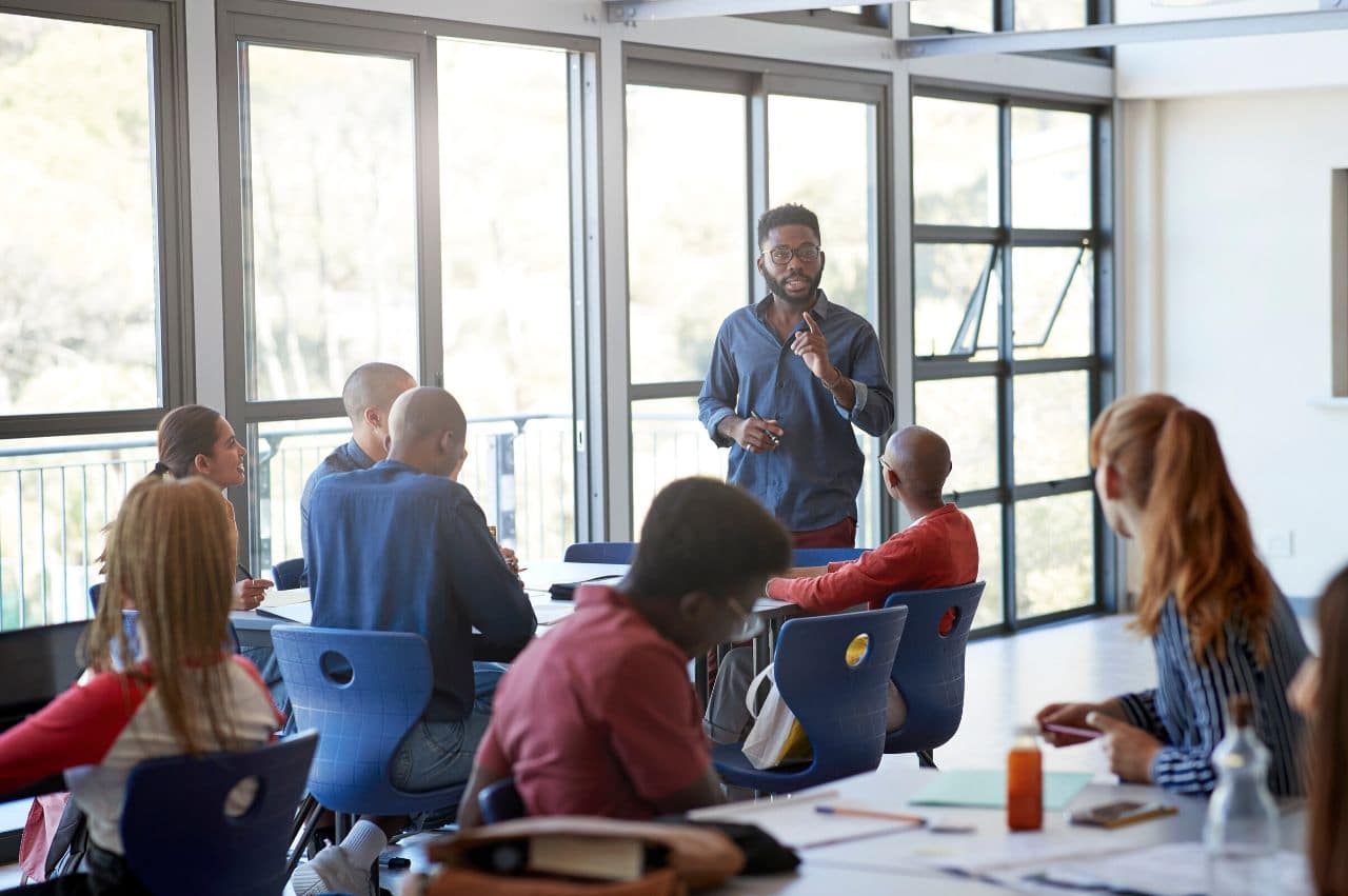 Students learning in a modern classroom setting
